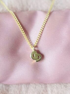 Like New Dior intricately designed 18k gold plated with renowned logo CDpendants